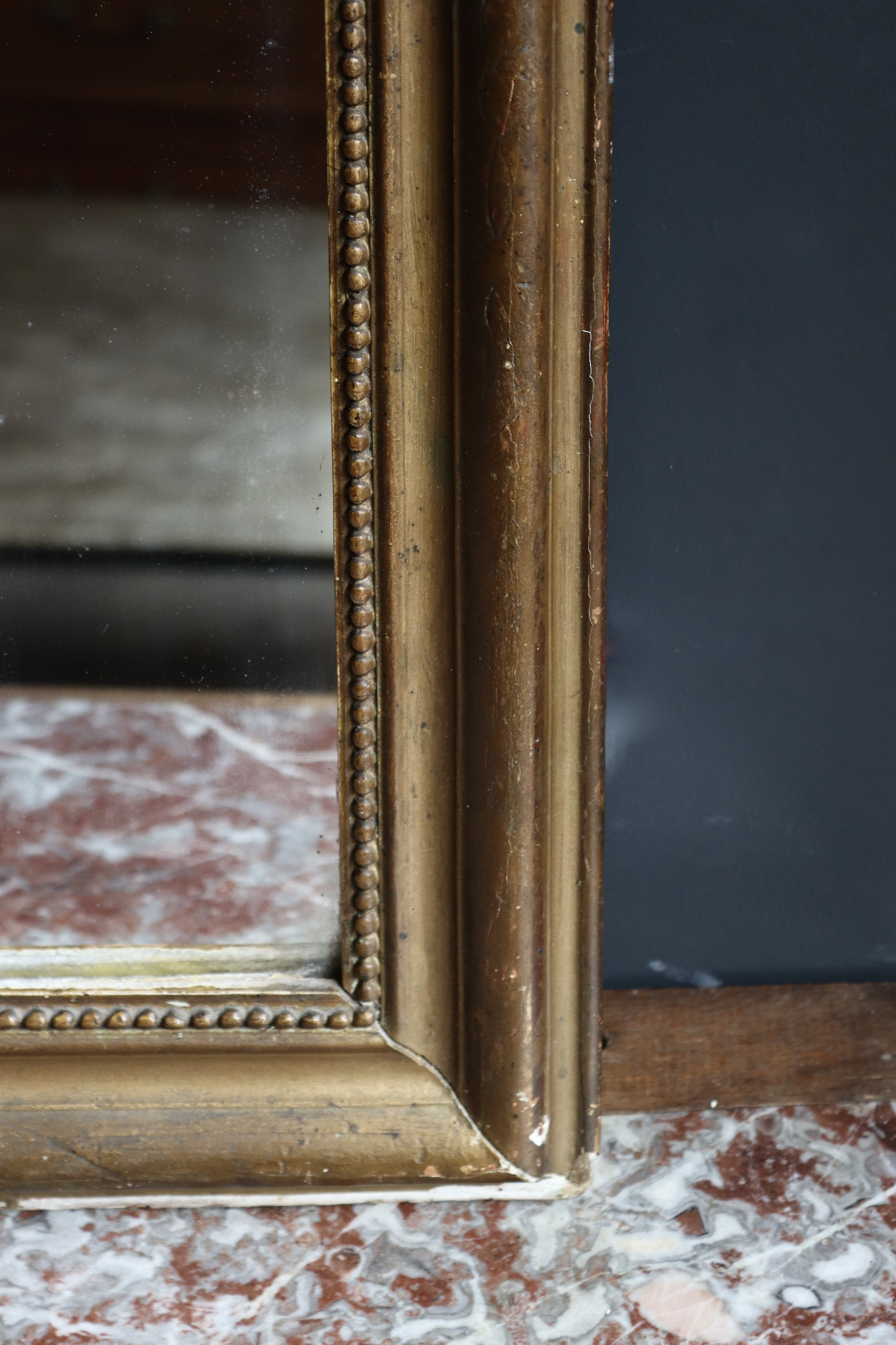 Miroir ancien en bois, bords arrondis