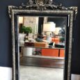 Miroir ancien en bois noir et doré